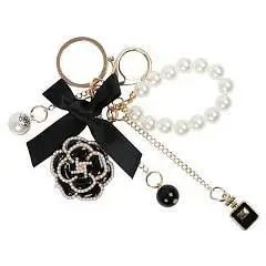 Брелок Fashion 11см пластик/металл КОКОС черно/белый, фото №1